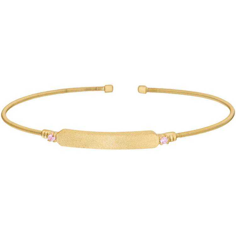 Gold finish sterling silver cable cuff bracelet with name plate and simulated pink sapphire birth gems - october