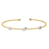 Gold finish sterling silver corean cable bracelet with 3 rhodium finish knots with simulated diamonds on the center knot