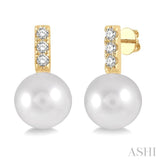 7 MM Cultured Pearls and 1/10 Ctw Round Cut Diamond Earrings in 10K Yellow Gold
