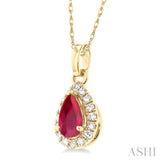 5x3 MM Pear Shape Ruby and 1/20 Ctw Single Cut Diamond Halo Precious Pendant with Chain in 10K Yellow Gold
