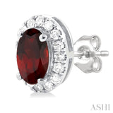 5x3 MM Oval Shape Garnet and 1/8 Ctw Round Cut Diamond Halo Semi-Precious Stud Earrings in 10K White Gold