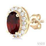 5x3 MM Oval Shape Garnet and 1/8 Ctw Round Cut Diamond Halo Semi-Precious Stud Earrings in 10K Yellow Gold