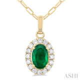 6x4 MM Oval Shape Emerald and 1/6 Ctw Round Cut Diamond Halo Precious Pendant with Chain in 14K Yellow Gold