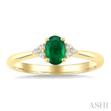 1/20 Ctw Oval Cut 6X4 MM Emerald and Round Cut Diamond Precious Ring in 10K Yellow Gold