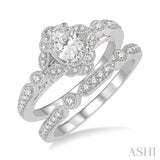 3/4 Ctw Round Cut Diamond Wedding Set With 5/8 Ctw Oval Cut Floral Engagement Ring and 1/10 Ctw Lattice Wedding Band in 14K White Gold