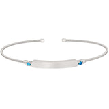 Rhodium finish sterling silver cable cuff bracelet with name plate and simulated blue zircon birth gems - december
