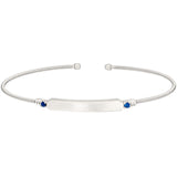 Rhodium finish sterling silver cable cuff bracelet with name plate and simulated blue sapphire birth gems - september