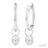 1/3 Ctw Bezel Set Oval Cut Diamond Huggie Earrings in 10K White Gold